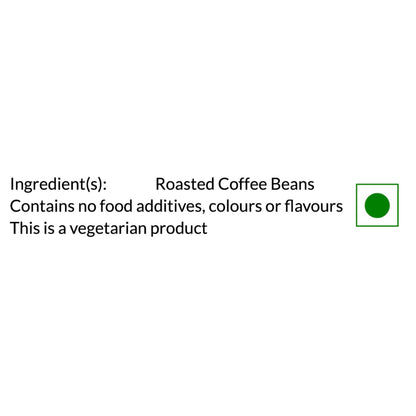 A white label with black text stating 'Ingredient(s): Roasted Coffee Beans' and 'Contains no food additives, colours or flavours This is a vegetarian product', alongside a green circle inside a thin green square.