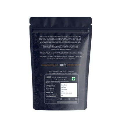 A dark blue home bend coffee roasters resealable stand-up pouch of food product shown from the back on a plain white background. The pouch has printed text, a white label area near the bottom, and a small green square logo near the lower right.